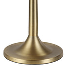 Close-up of Solara Rattan Glow Table Lamp brass base with smooth brushed finish