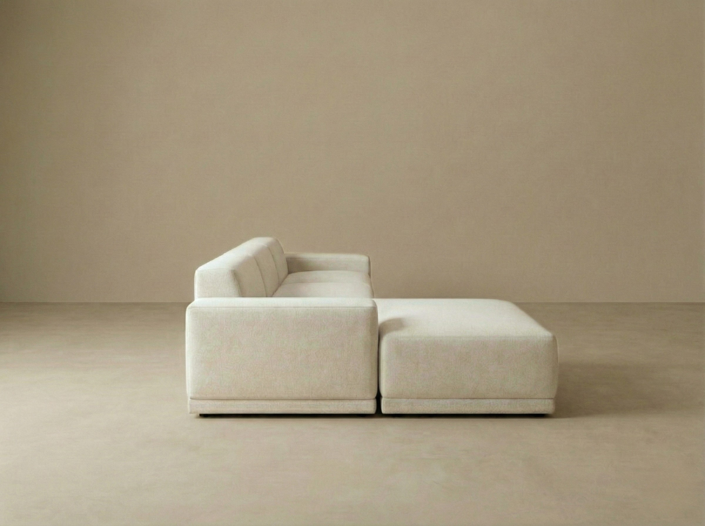 Side profile view of the Solis modular sofa showing the deep seat depth and seamless low back design.