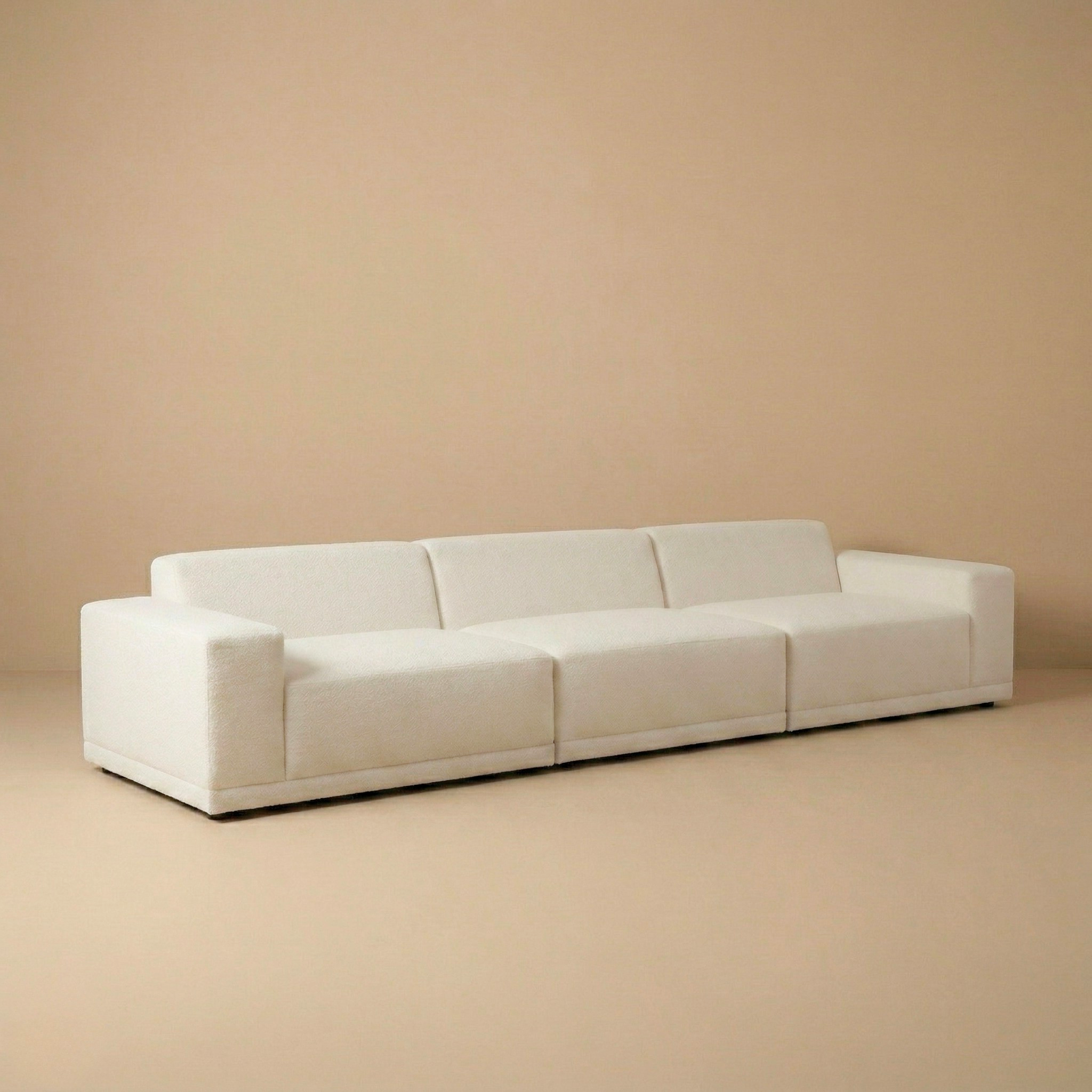 Beige sofa against a beige wall