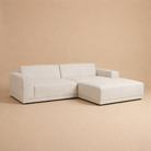 Beige sectional sofa on a beige background