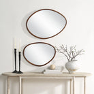 Solstice Wall Mirror Set displayed above a console table with decor accents