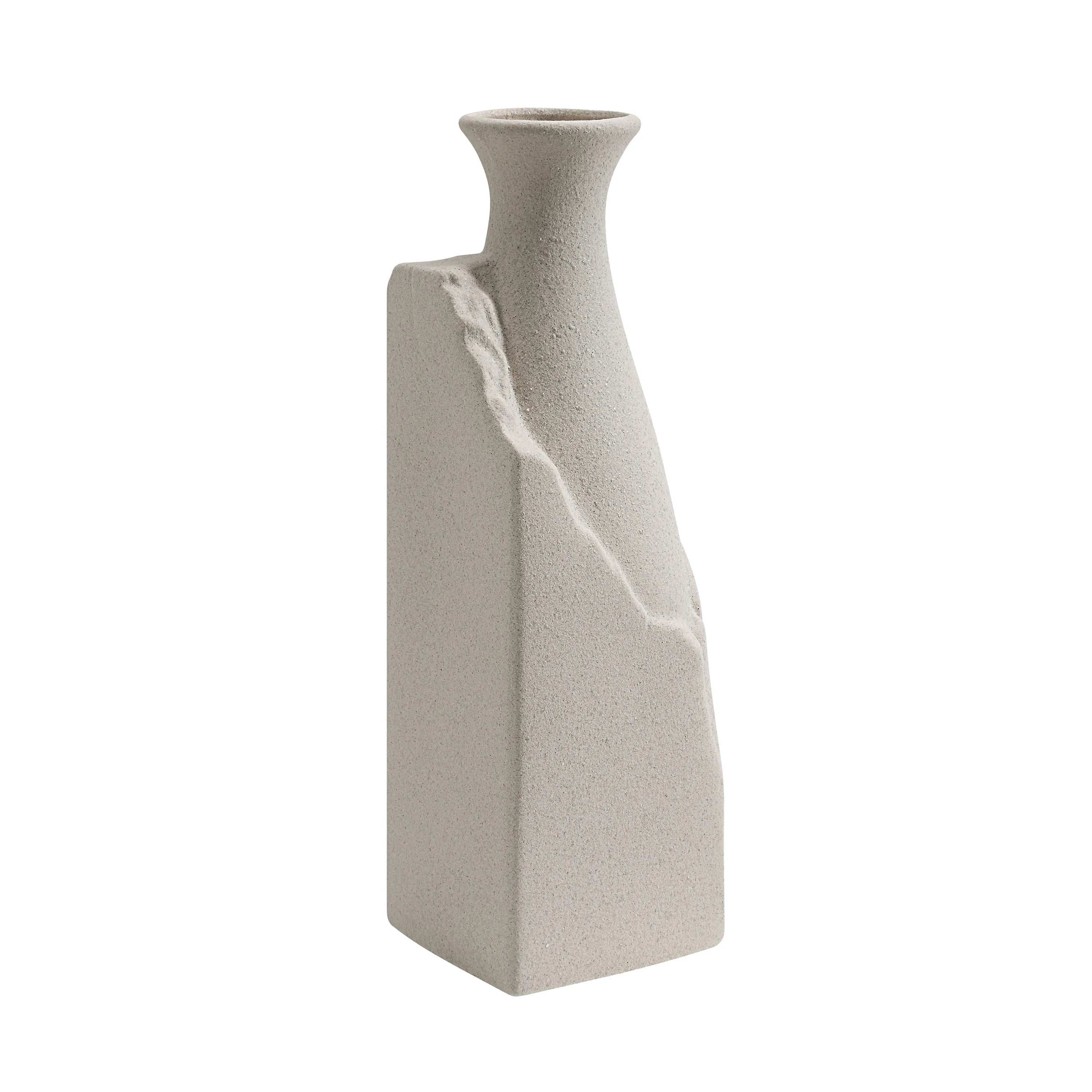 Side view of Terra Ridge Ceramic Vase highlighting sculpted ridge and matte beige texture