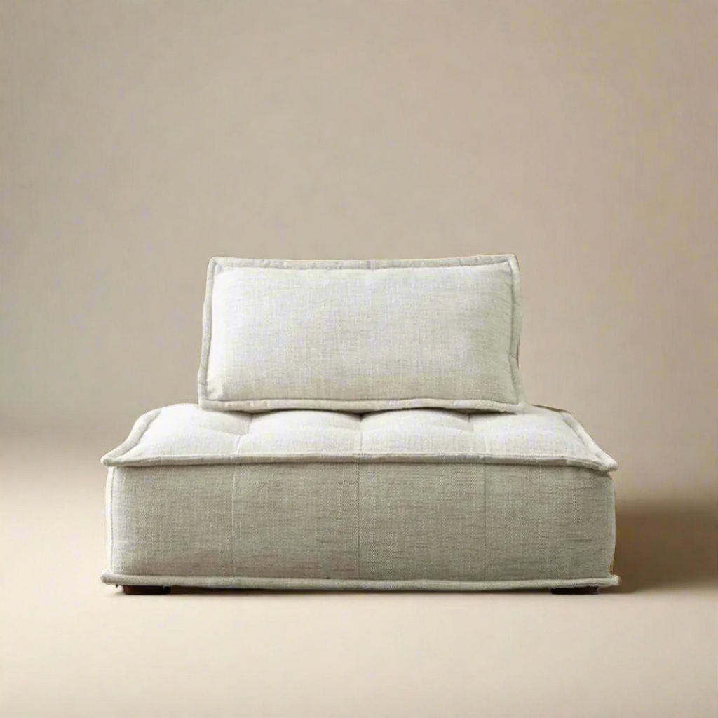 Front view of Tofu Modular Sofa in linen fabric with tufted seat and plush back cushion on neutral studio background