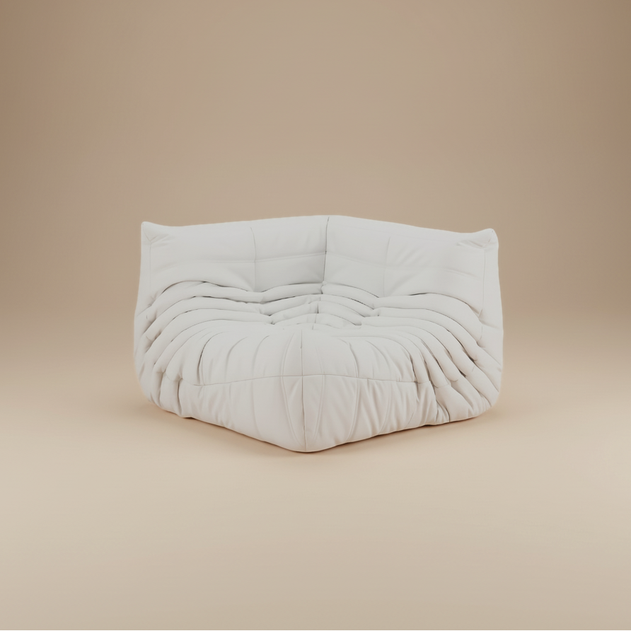 TOGO Lounger corner seat unit in white fabric featuring pleated design for modular sectional configuration.