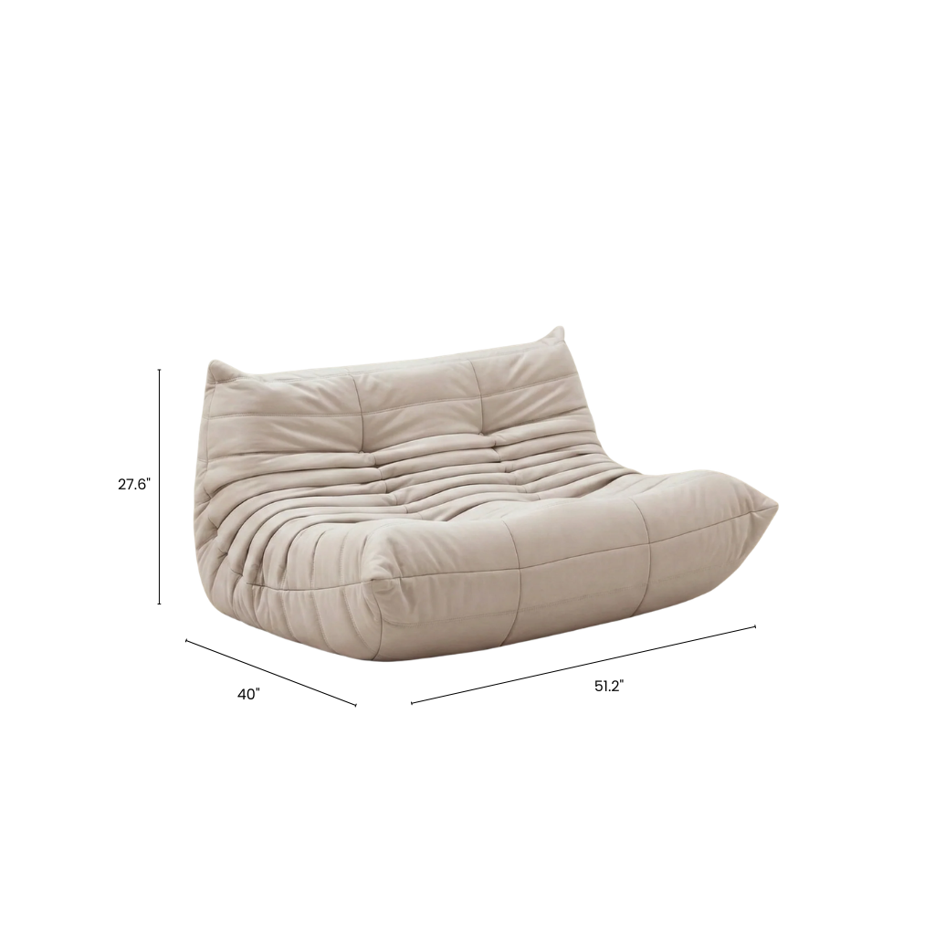 Beige lounge chair with dimensions on a white background