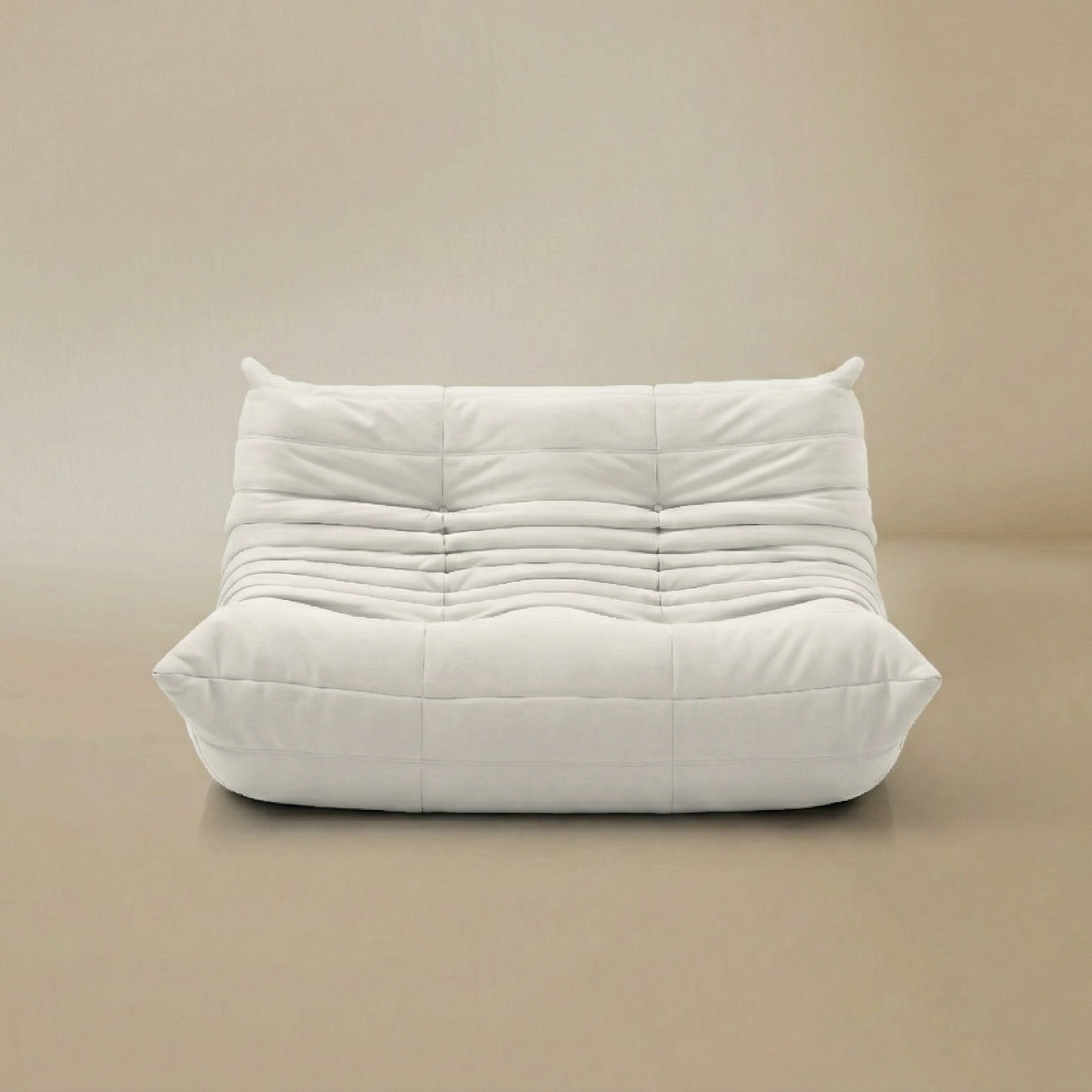 Front view of the TOGO Lounger two-seater in crisp white fabric.