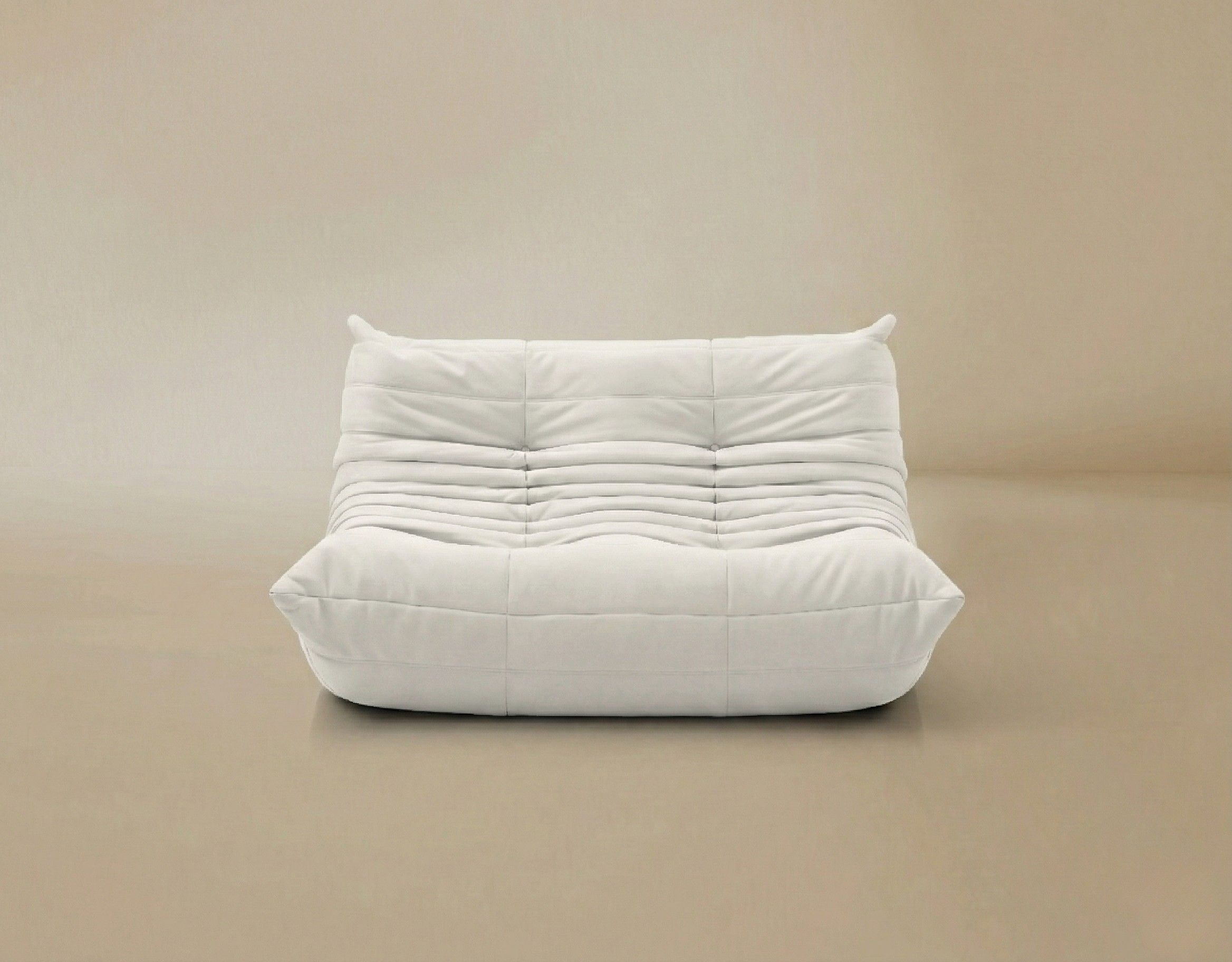 Front view of the TOGO Lounger two-seater in crisp white fabric.
