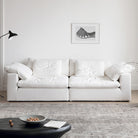 Ultra Softness Modular Cloud Sofa in natural linen with plush cushions styled in a bright modern living room with neutral decor