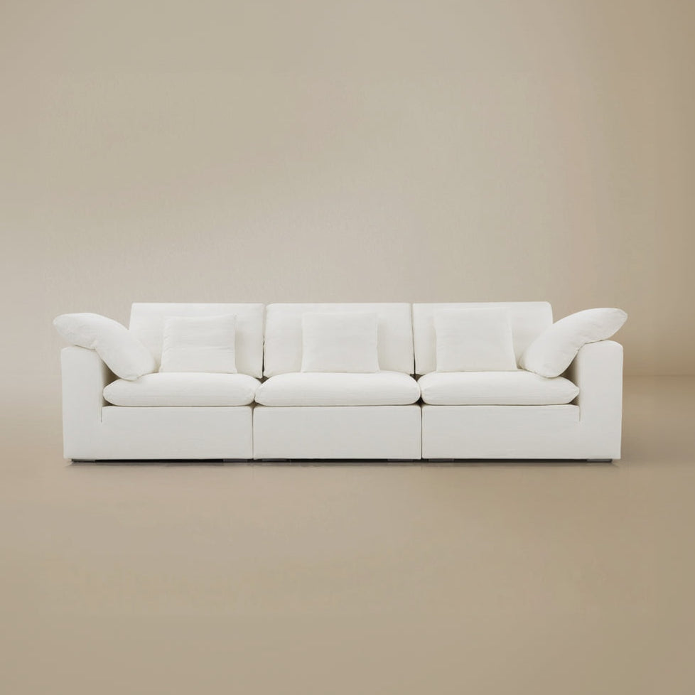 Front view of the Modular Cloud Sofa in a beige studio background.