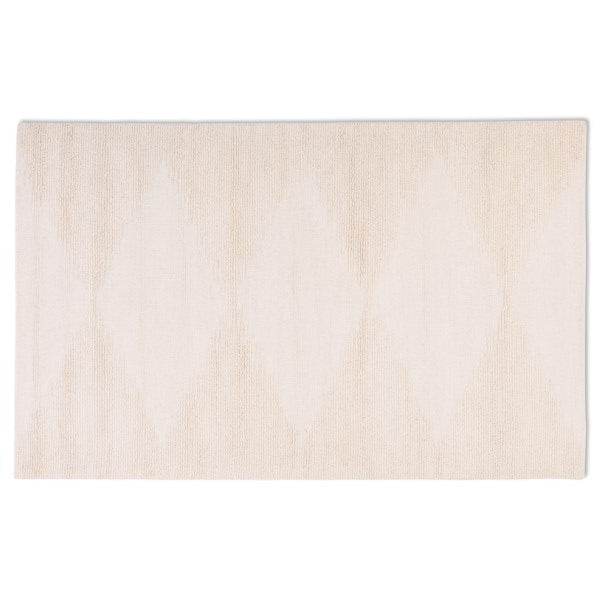 Full top-down view of the vinne hand-tufted wool rug in ivory, featuring a subtle geometric diamond pattern.