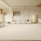 Zen Circles Rug in a modern beige living room with soft circular textured patterns